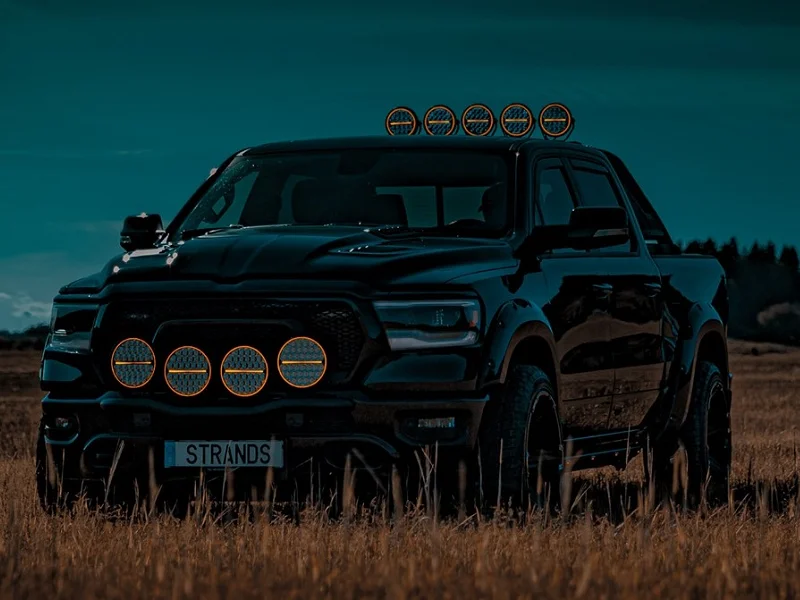 LED driving light mounted on Dodge Ram 1500 - mounted by Strands Lighting Division