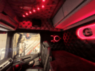 Truck interior with red lighting built into the headliner
