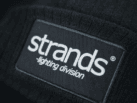 Strands beanie schwarz - Logo-Patch - Strickmütze - One Size - bequem und dehnbar - für den täglichen Gebrauch - Strands Merchandise - SLD20141